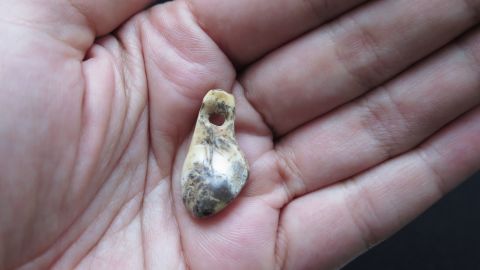 One of the pendants recovered from the cave.