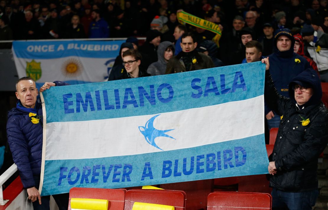 Cardiff fans hold up a banner in the colors of the Argentina flag honoring Emiliano Sala.