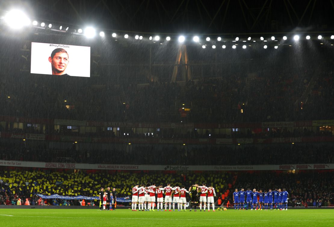 Players, fans and officals take part in a minute of silence in tribute to Emiliano Sala prior to the Premier League match between Fulham and Brighton.
