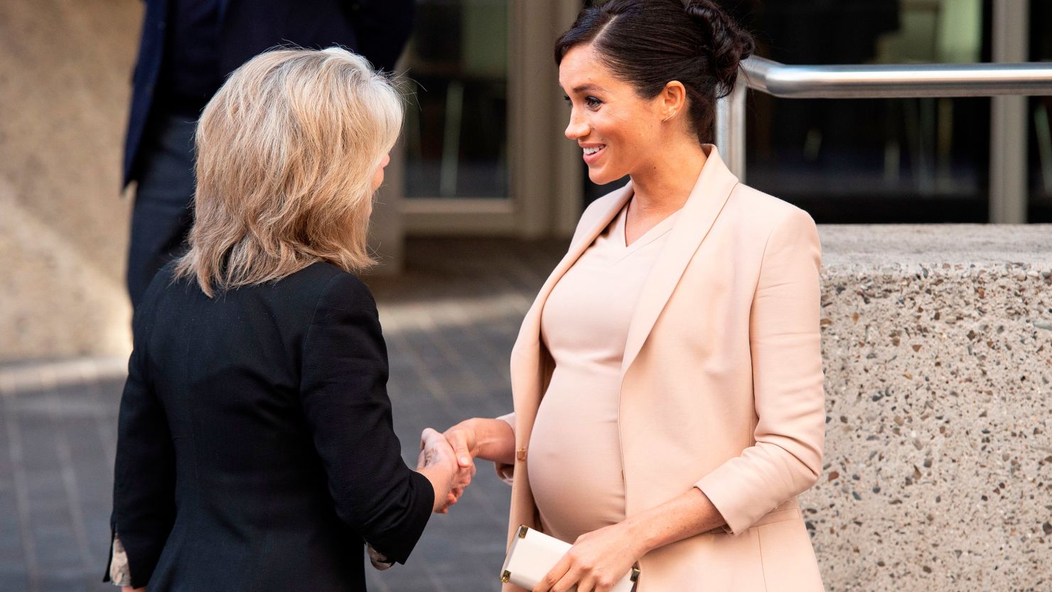 Meghan, Duchess of Sussex, made her first official visit to the National Theater since becoming a patron.