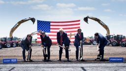 TOPSHOT - Wisconsin Governor Scott Walker (2nd L), US President Donald Trump (C), Foxconn Chairman Terry Gou (2nd R), Speaker of the House Paul Ryan (R) and an unidetified official (L) participate in a groundbreaking for a Foxconn facility at the Wisconsin Valley Science and Technology Park on June 28, 2018 in Mount Pleasant, Wisconsin. (Photo by Brendan Smialowski / AFP)        (Photo credit should read BRENDAN SMIALOWSKI/AFP/Getty Images)