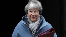 (FILES) In this file photo taken on January 21, 2019 British Prime Minister Theresa May leaves 1o Downing Street to make a statement to the House of Commons in London on, on changes to her Brexit withdrawal agreement. 