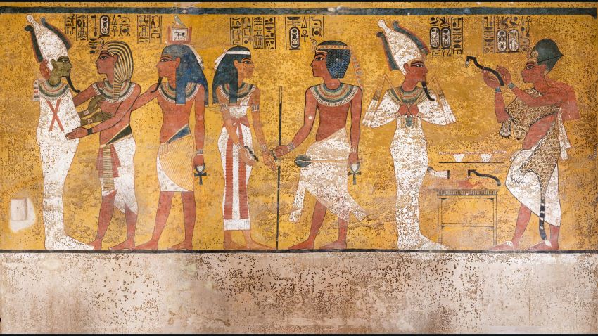 The north wall of the burial chamber depicts three separate scenes, ordered from right to left. In the first, Ay, Tutankhamun's successor, performs the "opening of the mouth" ceremony on Tutankhamun, who is depicted as Osiris, lord of the underworld. In the middle scene, Tutankhamen, dressed in the costume of the living king, is welcomed into the realm of the gods by the goddess Nut. On the left, Tutankhamun, followed by his ka (spirit twin), is embraced by Osiris.
