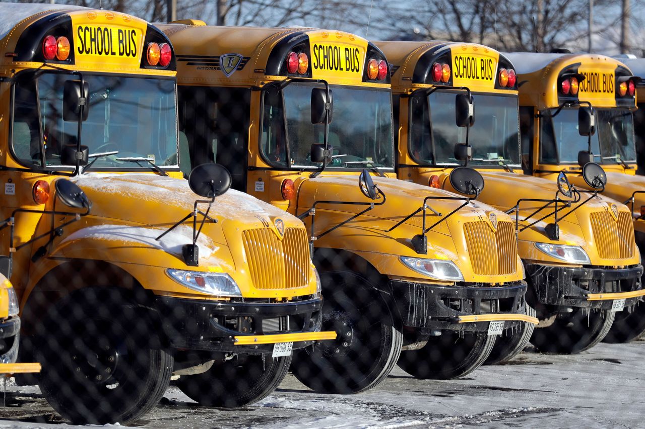 School buses are parked in Skokie, Illinois, on January 30. Local schools were closed for the day because of the weather.