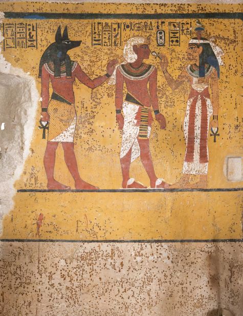 A nine-year project has concluded, conserving King Tutankhamun's tomb for future generations to enjoy.<br />Clearly visible in this painting in Tutankhamun's burial chamber are brown dots of microbial growth. The painting  shows King Tut with various deities. He stands before Hathor, goddess of the West, while behind the king stands Anubis, the embalmer god. 