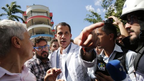 Opposition National Assembly President Juan Guaido speaks to reporters in Caracas, Venezuela, Wednesday, Jan. 30, 2019. 