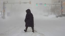 A woman crosses a street during a winter storm in Buffalo, New York, U.S., January 30, 2019. REUTERS/Lindsay Dedario