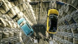 WOLFSBURG, GERMANY - DECEMBER 04: A Volkswagen T-Cross and a Volkswagen t-Roc are presented in one of the twin car towers at the Volkswagen Autostadt visitors center on December 4, 2018 in Wolfsburg, Germany. Volkswagen, Germany's biggest carmaker, has been embroiled in a costly emissions scandal after it installed illegal software in millions of its cars. The car giant announced recently that the company will face a difficult year in 2019 due to ongoing court cases stemming from the software, designed to manipulate emissions in diesel cars, which has so far cost the company EUR 28 billion in fines and costs. (Photo by Carsten Koall/Getty Images)