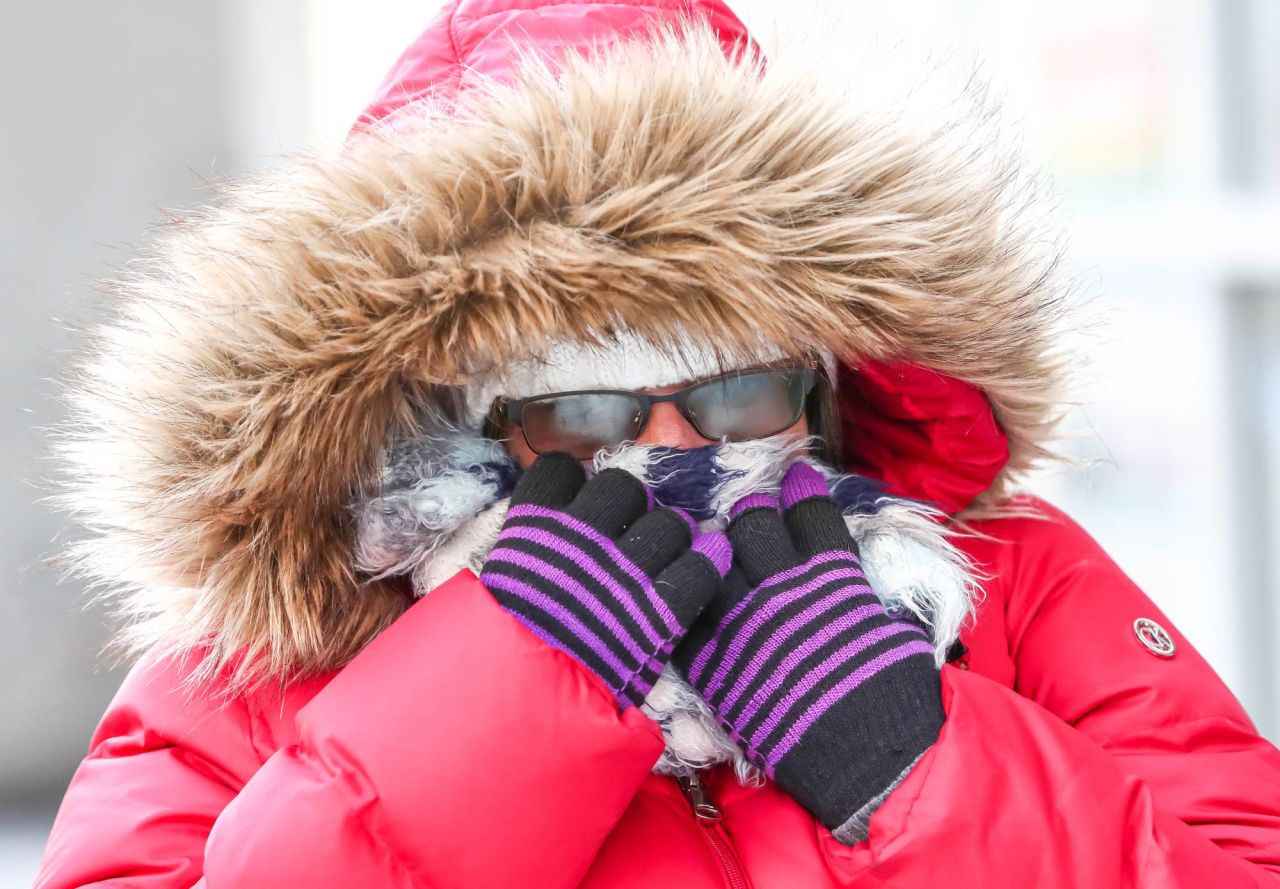 Donna Miller endures frigid temperatures heading to the bank in Indianapolis on January 30.