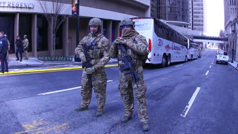 Department of Homeland Security agents guard the streets near the hotel hosting the New England Patriots.