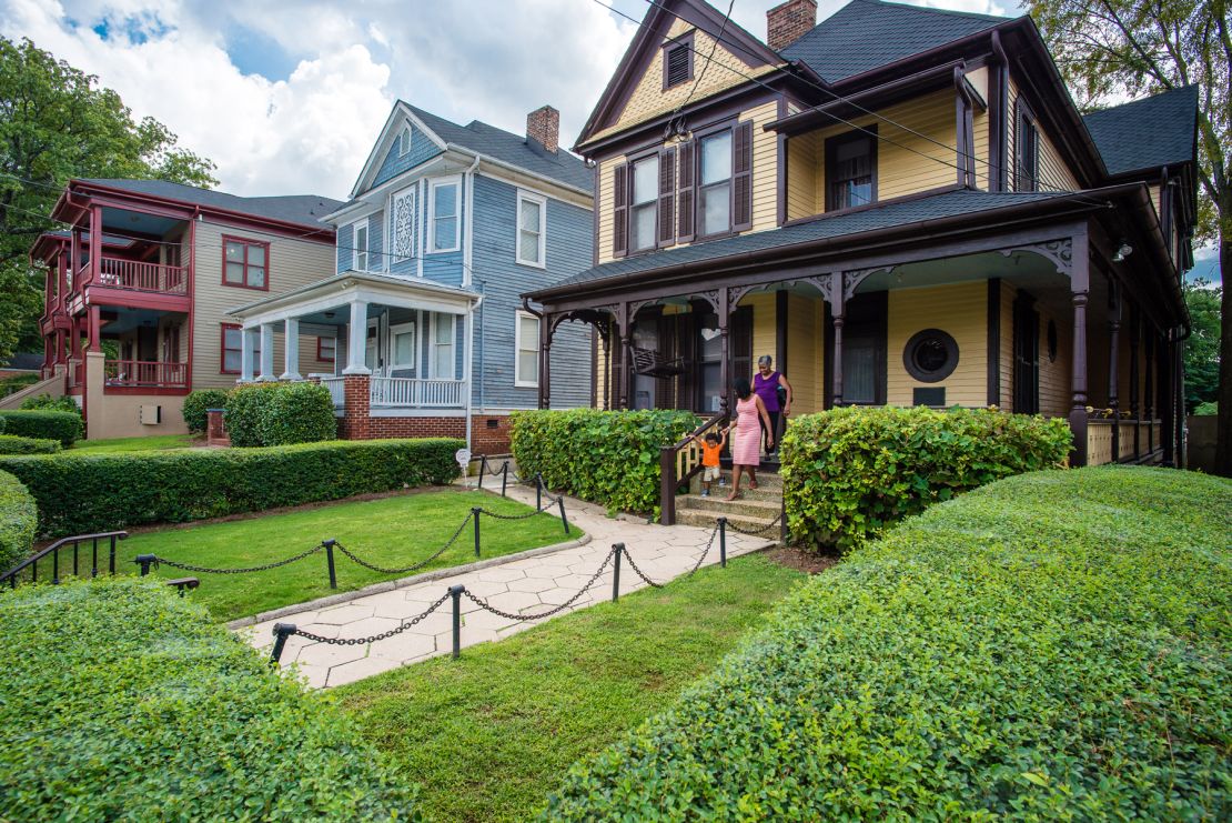 Martin Luther King Jr. was born in this house, right, on Auburn Avenue.