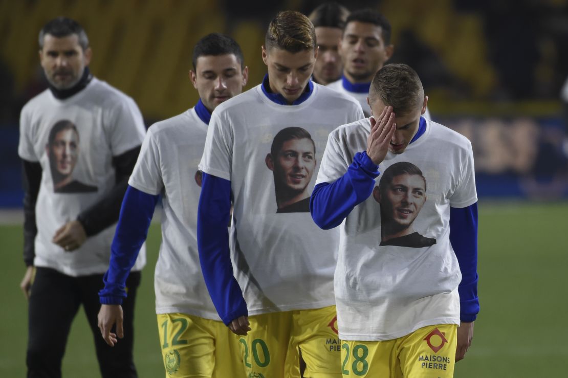 Nantes' first team wear t-shirts picturing Sala as they warm up for a match.
