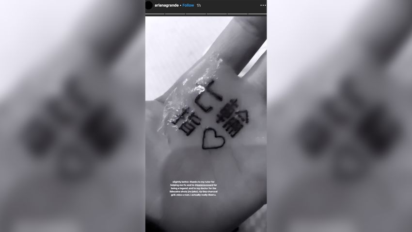 Ariana Grande 'fixes' misspelled palm tattoo after uproar