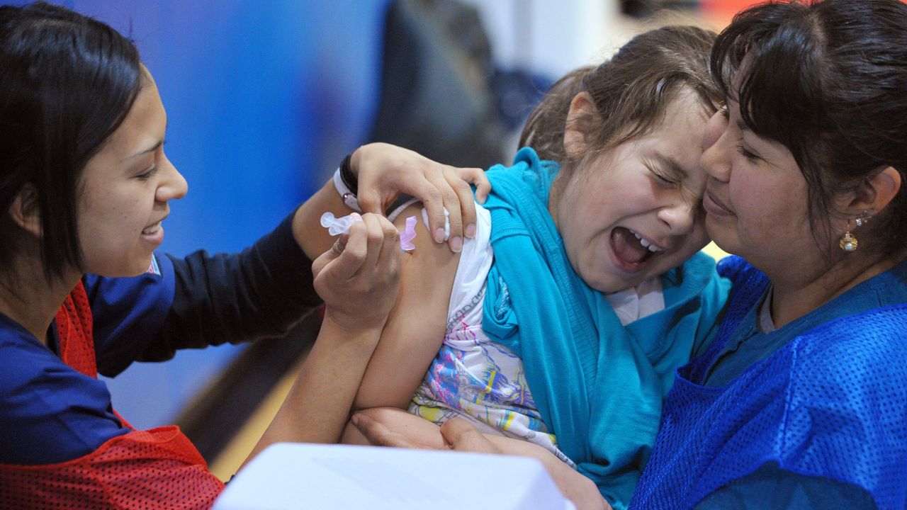 A student at Carlin Springs Elementary School in Virginia receives an H1N1 flu vaccination.