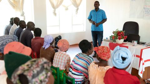 Jemitias Denhere, Agriculture Officer, teaches a class of farmers from across Mwenezi at the Red Cross farming school.
