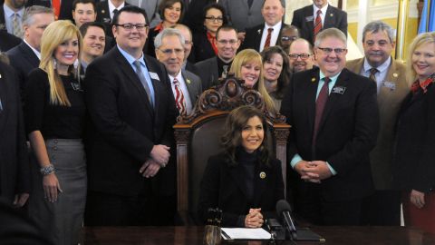 Gov. Kristi Noem signs her first bill into law on Thursday,  allowing people to carry concealed pistols without a permit in South Dakota. 
