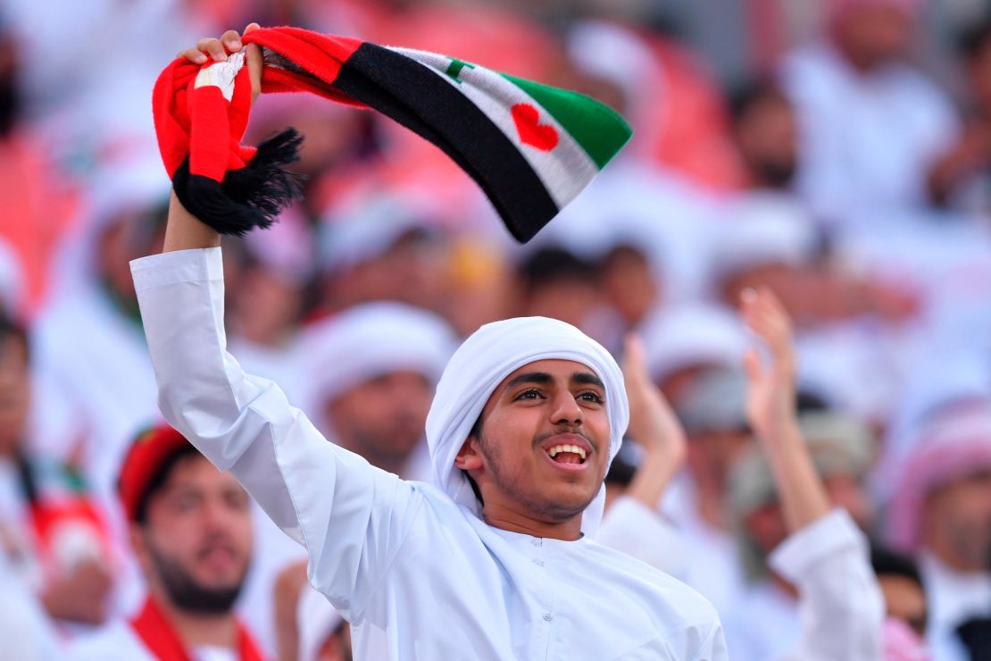 A UAE fan cheers during the semifinal between Qatar and UAE.