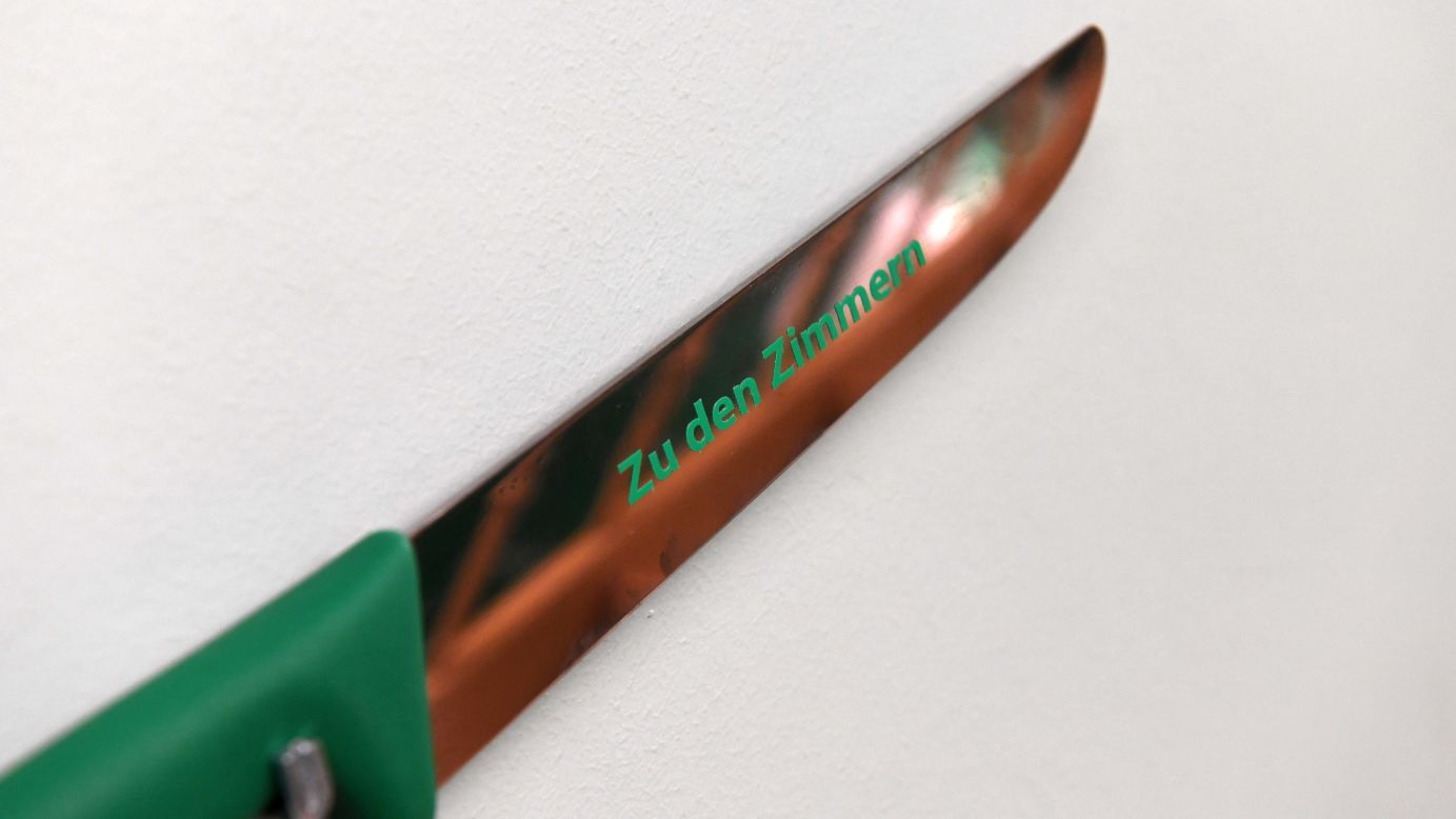 <strong>Wurst nightmare?</strong> Some of the design touches are a bit creepy -- such as this butcher's knife reading "Zu den Zimmern" ("To the Rooms"), which acts as a guidepost. 