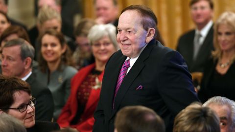 US businessman Sheldon Adelson is recognized by  President Donald Trump during the Presidential Medal of Freedom ceremony at the White House in Washington in 2018. Adelson's wife, Miriam, is a recipient of the medal. (SAUL LOEB/AFP/Getty Images)