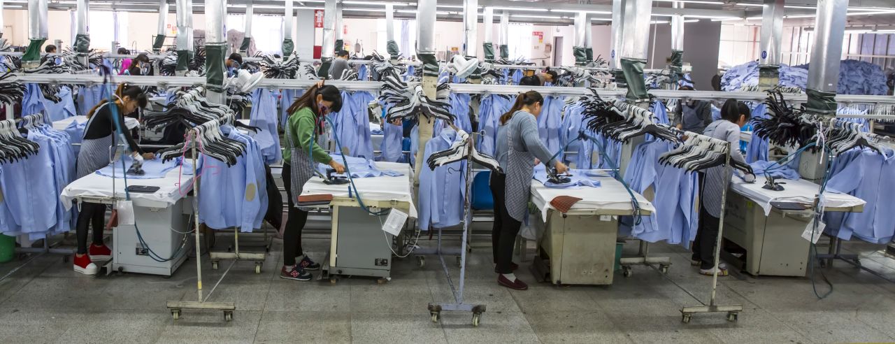 Women work in a shirt factory in Nantong, in China's Jiangsu province.