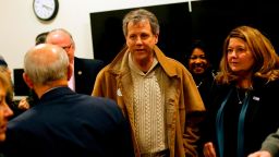 U.S. Senator and 2020 presidential candidate Sherrod Brown (D-OH) and his wife Connie Schultz (R) take a tour of the University of Northern Iowa's Tech Works campus during a campaign stop on February 1, 2019 in Waterloo, Iowa. - Even as bitter cold ravages several US states, the 2020 presidential race is heating up in Iowa, where Democrats both renowned and unfamiliar are seizing early opportunities to engage critically important American voters. One full year before the first-in-the-nation voting contest for nominating who will take on incumbent Donald Trump, White House aspirants braved dangerously frigid temperatures this week to make their presidential pitch on hallowed political ground. (Photo by Joshua Lott / AFP)        (Photo credit should read JOSHUA LOTT/AFP/Getty Images)