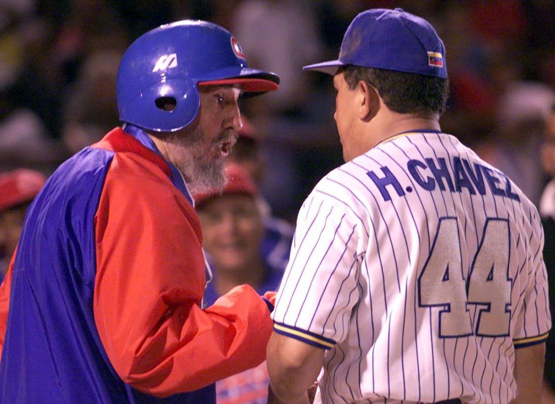 Castro talks with  Chavez before a friendly baseball game between the Cuban and Venezuelan teams, in Venezuela in 2000. 