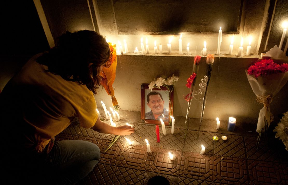 Supporters of  Chavez light candles in front of the Venezuelan Embassy  in Santiago, Chile, in 2013.