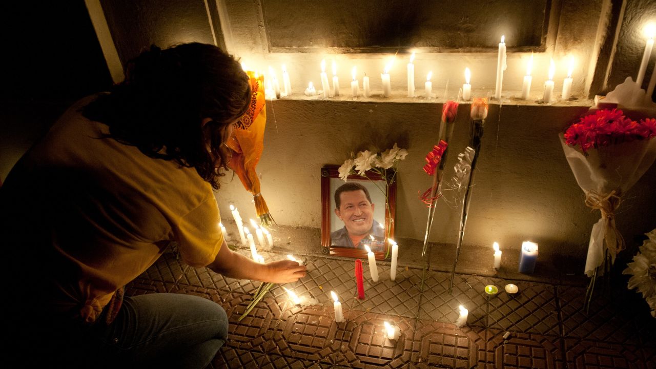 Supporters of Chavez light candles in front of the Venezuelan Embassy in Santiago, Chile, in 2013.