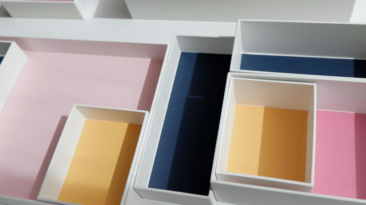 Marie Kondo displays her new line of storage boxes during a media event in New York.