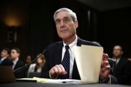 WASHINGTON, DC - JUNE 19: Federal Bureau of Investigation (FBI) Director Robert Mueller waits for the beginning of a hearing before the Senate Judiciary Committee June 19, 2013 on Capitol Hill in Washington, DC. Mueller confirmed that the FBI uses drones for domestic surveillance during the hearing on FBI oversight. (Photo by Alex Wong/Getty Images)