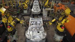 SUNDERLAND, ENGLAND - JANUARY 24:  Robotic arms assemble and weld the body shell of a Nissan car on the production line at Nissan's Sunderland plant on January 24, 2013 in Sunderland, England. The Japanese manufacturer's factory employs 6,225 people producing the Juke, Note and Qashqai models. In 2012 the Wearside facility built 510,572 cars to become the first ever UK automobile plant to have produced more than half a million cars in a year, which was 34.8 percent of the cars produced in the whole of the UK for 2012.  (Photo by Christopher Furlong/Getty Images)