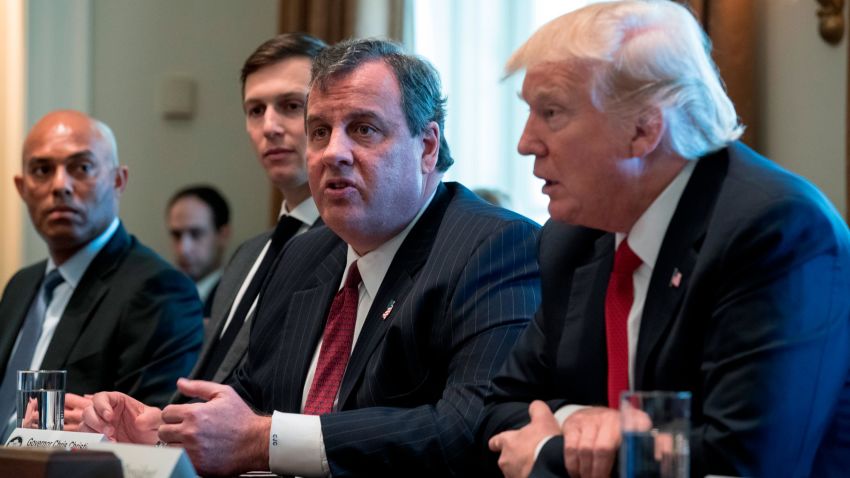 New Jersey Gov. Chris Christie speaks as U.S. President Donald Trump looks on at a panel discussion on an opioid and drug abuse in the Roosevelt Room of the White House March 29, 2017 in Washington, DC.  