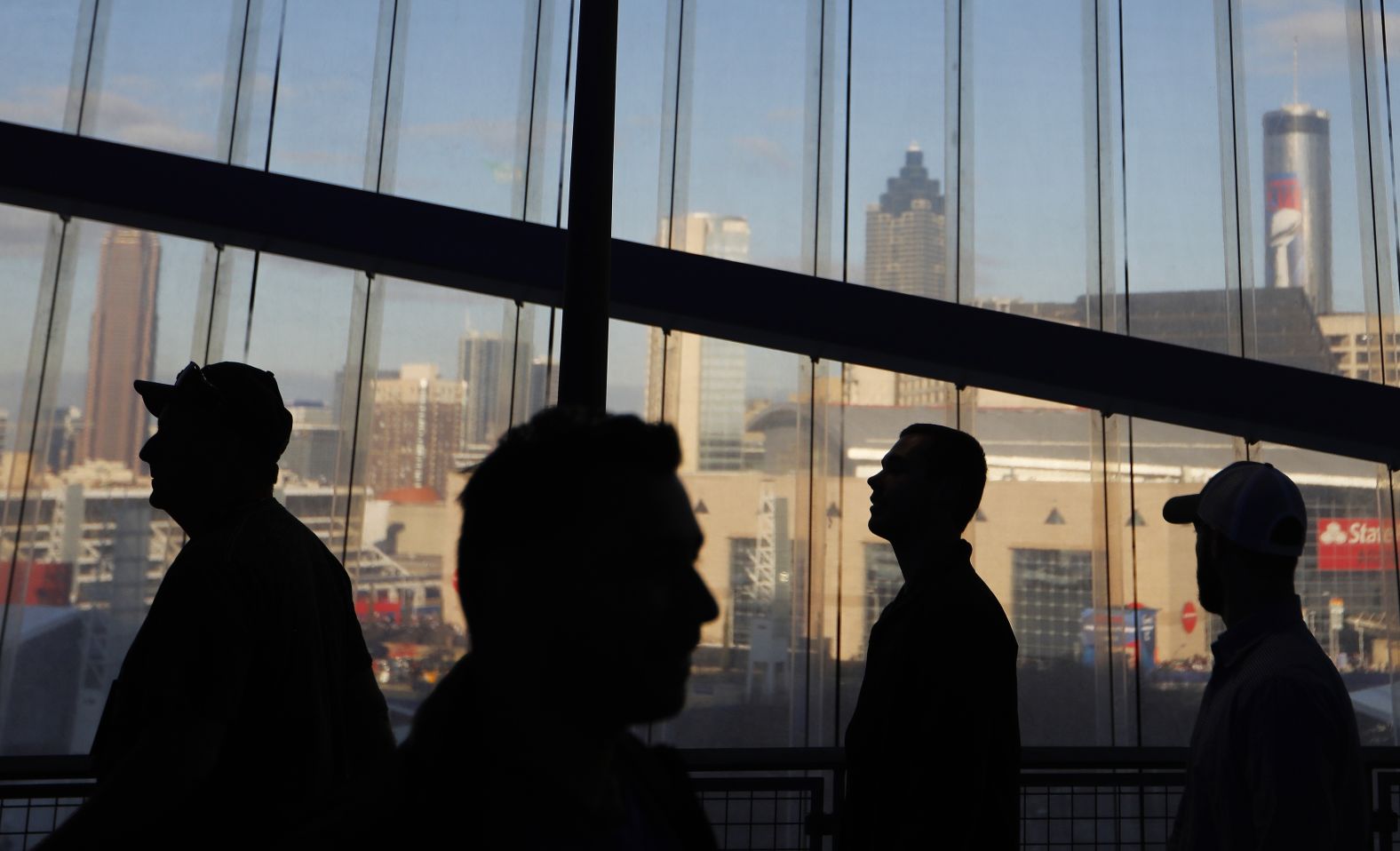 Fans walk inside Mercedes-Benz Stadium, which was hosting its first Super Bowl. The stadium, which features a retractable roof, opened in August 2017.