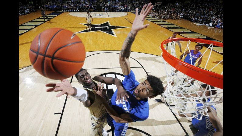Kentucky's Nick Richards tries to block the shot of Vanderbilt's Simisola Shittu during an SEC basketball game on Tuesday, January 29.