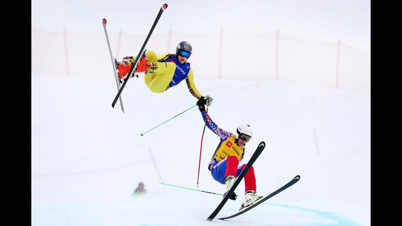 Germany's Tim Hronek and Russia's Maxim Vikhrov crash in a ski-cross race at the World Championships on Saturday, February 2.