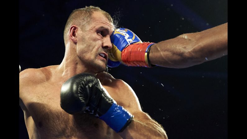 Sergey Kovalev is hit by Eleider Alvarez during a light-heavyweight title fight on Sunday, February 3. Kovalev won by unanimous decision, avenging his August loss to Alvarez.
