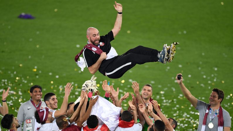 Qatari soccer players throw coach Felix Sanchez into the air after they defeated Japan <a href="index.php?page=&url=https%3A%2F%2Fwww.cnn.com%2F2019%2F02%2F01%2Ffootball%2Fqatar-japan-asian-cup-final-spt-intl%2Findex.html" target="_blank">to win their first Asian Cup</a> on Friday, February 1.