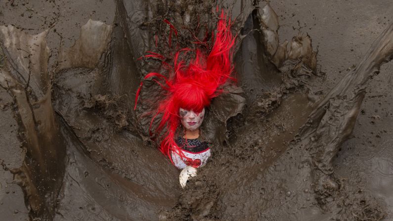 A competitor falls in a muddy pool during a Tough Guy endurance race that was held near Wolverhampton, England, on Sunday, January 27.