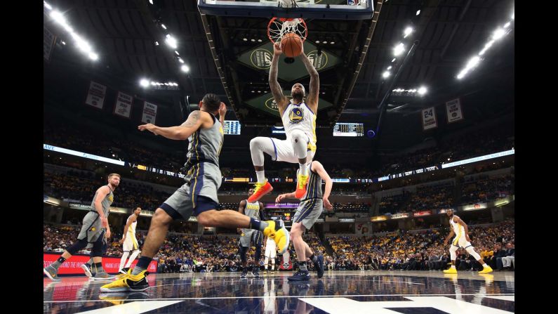Golden State's DeMarcus Cousins throws down a dunk against Indiana during an NBA game on Monday, January 28.