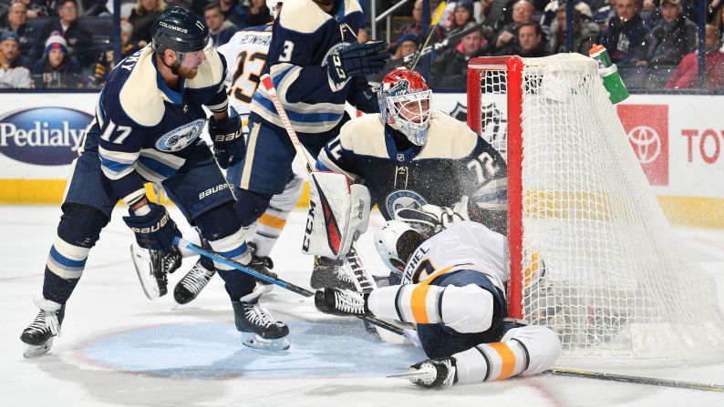 Buffalo's Jack Eichel collides with the goalpost during an NHL game in Columbus, Ohio, on Tuesday, January 29.