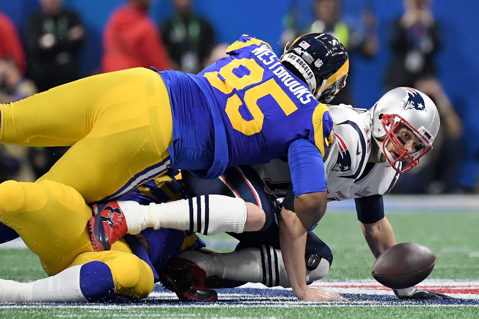 Brady fumbles the ball in the scoreless first quarter. It was the first time Brady has been sacked during this postseason. The Patriots recovered the ball.