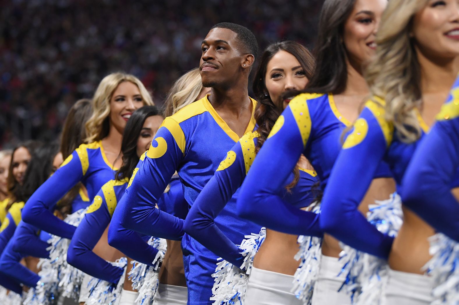 Rams cheerleader Quinton Peron looks on during Super Bowl LIII. This is the first Super Bowl <a href="index.php?page=&url=https%3A%2F%2Fwww.cnn.com%2F2019%2F02%2F02%2Fopinions%2Fsuper-bowl-male-cheerleaders-debut-roxanne-jones%2Findex.html" target="_blank">to feature male cheerleaders. </a>