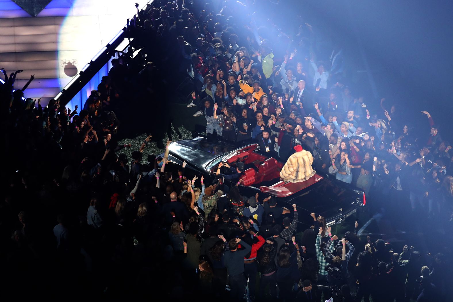 Big Boi, one half of the Atlanta rap duo OutKast, comes in on the back of a Cadillac.