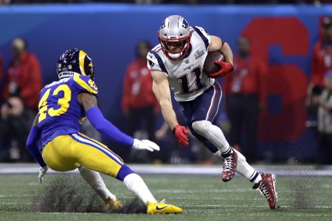 Edelman tries to elude John Johnson III after catching a pass early in the second half. 