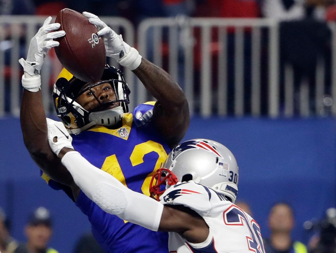 Patriots defensive back Jason McCourty breaks up a pass in the end zone that was intended for Rams wide receiver Brandin Cooks in the third quarter.