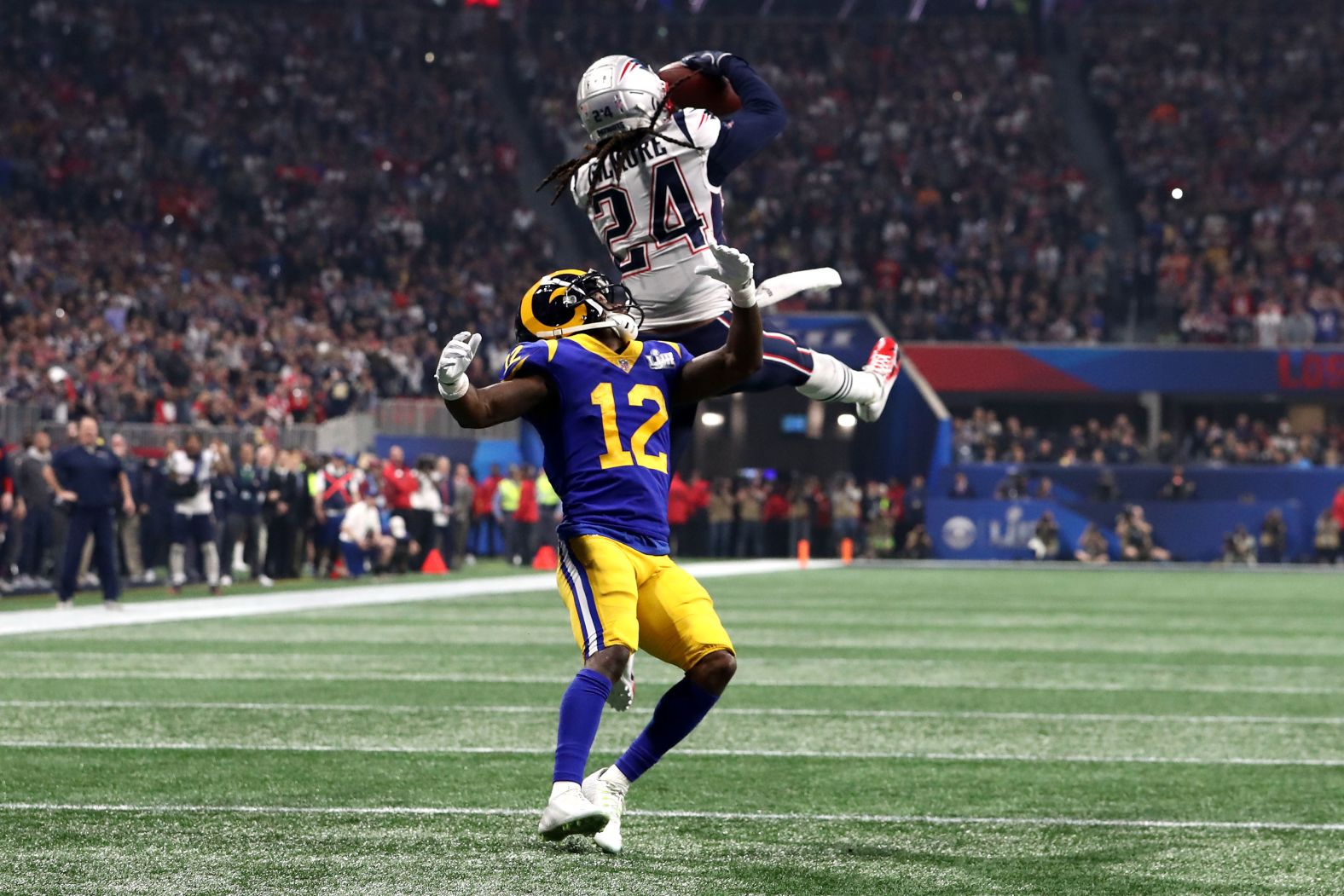 Patriots defensive back Stephon Gilmore leaps for a fourth-quarter interception.