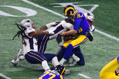 Kyle Van Noy tackles Goff in the second half. Goff was sacked four times in the game.