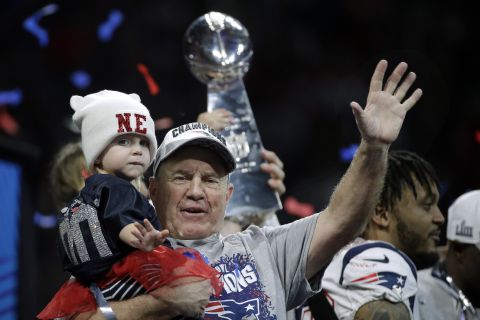 Bill Belichick waves after winning his sixth Super Bowl as head coach.
