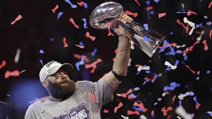 New England Patriots' Julian Edelman holds the Vince Lombardi Trophy, after the NFL Super Bowl 53 football game against the Los Angeles Rams, Sunday, Feb. 3, 2019, in Atlanta. The Patriots won 13-3. Edelman was named the Most Valuable Player. (AP Photo/Jeff Roberson)
