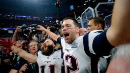 New England Patriots' Julian Edelman, left, and Tom Brady celebrate after the NFL Super Bowl 53 football game against the Los Angeles Rams, Sunday, Feb. 3, 2019, in Atlanta. The Patriots won 13-3. Edelman was named the Most Valuable Player.(AP Photo/David J. Phillip)